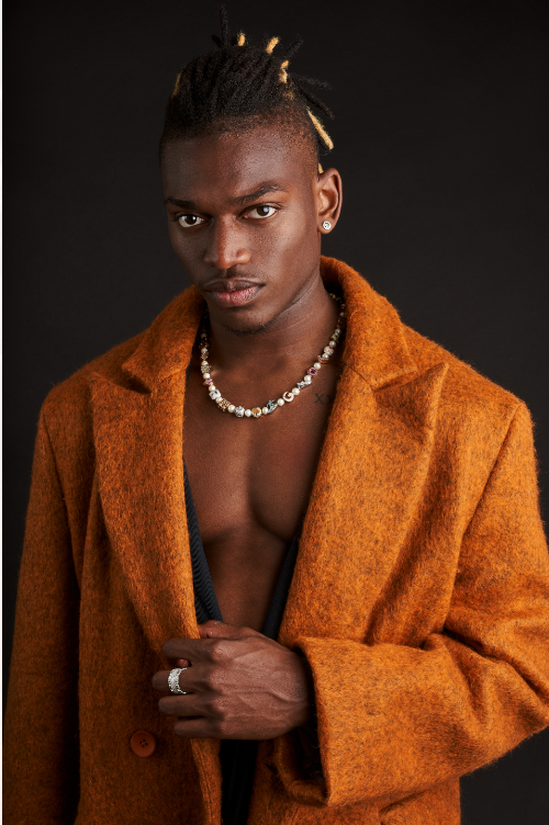 Portrait of a man in an orange coat
